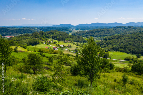 Aerial view of green hills and nature in Zagorje  northern Croatia on sunny summer day