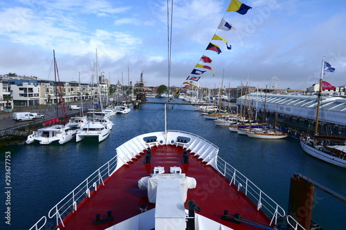 View from the prow of a ship sailing into the French port of La Rochelle photo