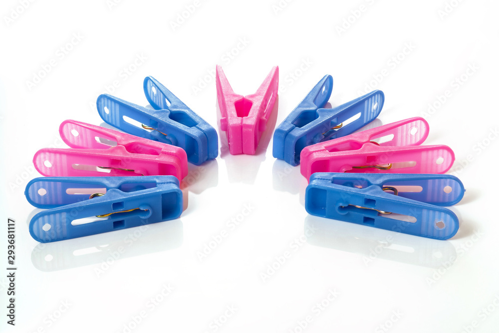 Colored clothespins, on a white background, close-up Colored clothespins, on a white background, close-up