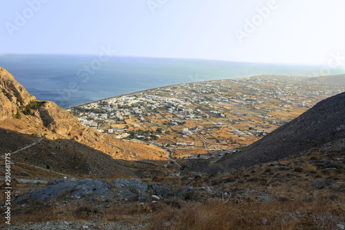 View of the village of Perissa on the island of Santorini extending from the trail leading to the peak of Profitis Ilias