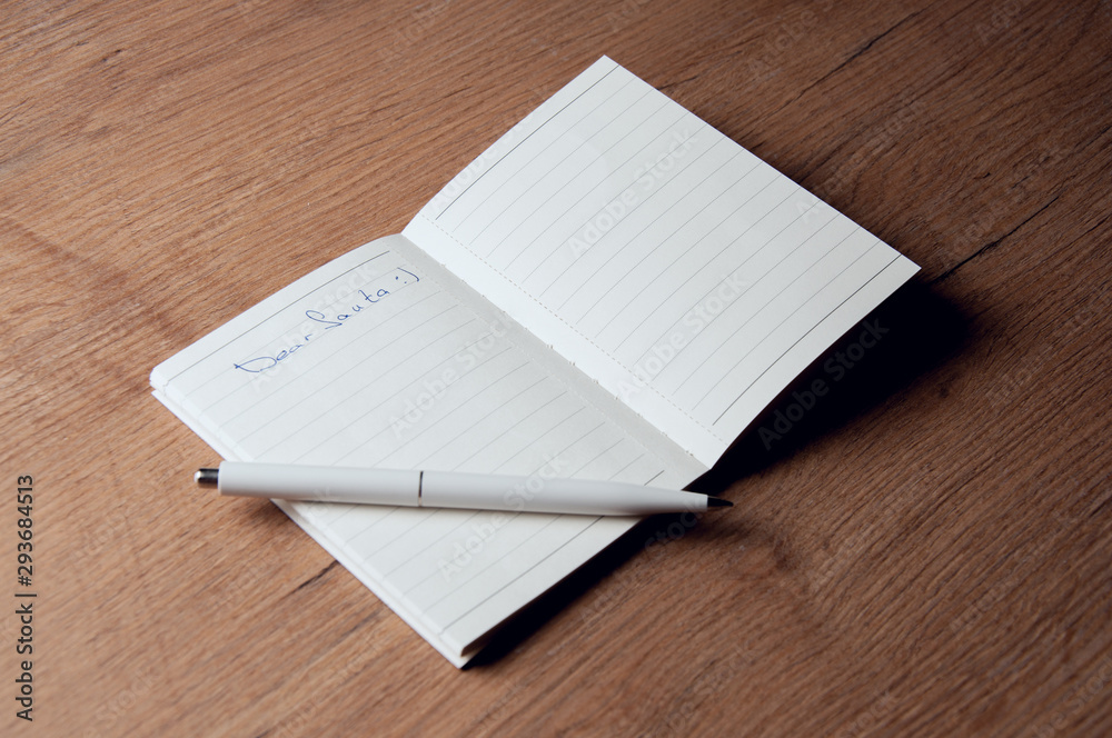 Writing notes about the environment in a notebook. Pocket Notebook. Writing notes about the environment in a notebook. Pocket Notebook.