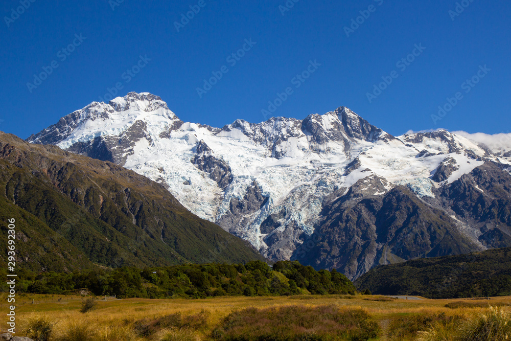 view of Mount Cook and surrounding mountains from Aoraki Mount Cook Village view of Mount Cook and surrounding mountains from Aoraki Mount Cook Village