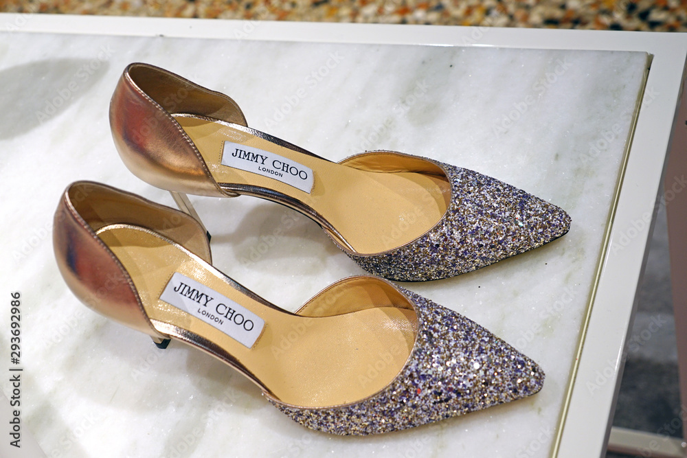 VENICE, ITALY -8 APR 2019- View of expensive high heel pump shoes by luxury  footwear brand Jimmy Choo London for sale in a store in Venice. фотография  Stock | Adobe Stock