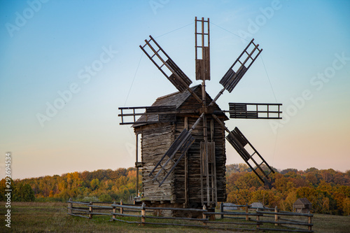 old wooden windmill in the village