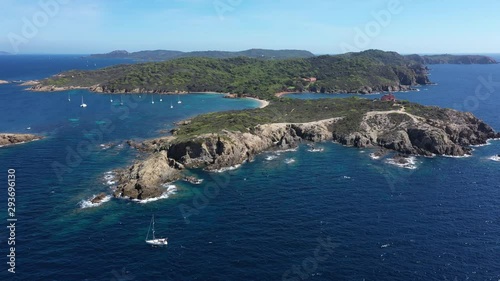 Pointe Sainte Anne Langoustier beach aerial view with a sailing boat along the coast Porquerolles France photo