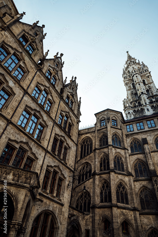 The inside facade of the beautiful gothic style New Town Hall or Rathaus on Marienplatz in old  town Munich, Bavaria, Germany. Vertical photo.