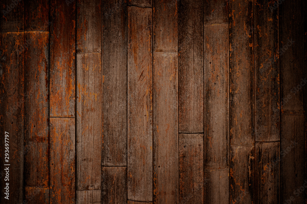 Warm orange and red brown reclaimed wood surface with aged boards lined up. Wooden planks on a wall or floor with grain and texture. Neutral stained vintage wood background. Warm orange and red brown reclaimed wood surface with aged boards lined up. Wooden planks on a wall or floor with grain and texture. Neutral stained vintage wood background.