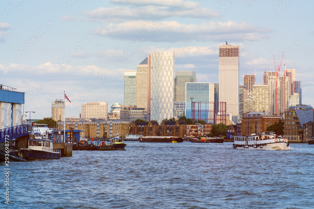 The river Thames in London with Canary Wharf on the background