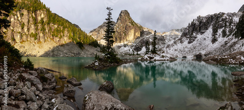 Beautiful View of a Glacier Lake in the Canadian Mountain Landscape during a colorful and vibrant sunset in Fall Season. Taken in Watersprite Lake, Squamish, North of Vancouver, BC, Canada. photo