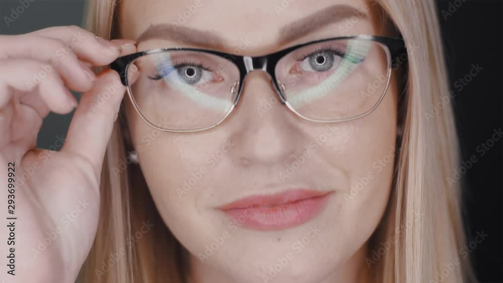 portrait of independent successful young business woman in glasses with beautiful white hair. positive feminine background portrait of independent successful young business woman in glasses with beautiful white hair. positive feminine background