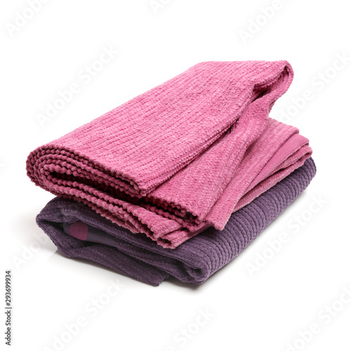 Stacked linen Sofa mats on white background
