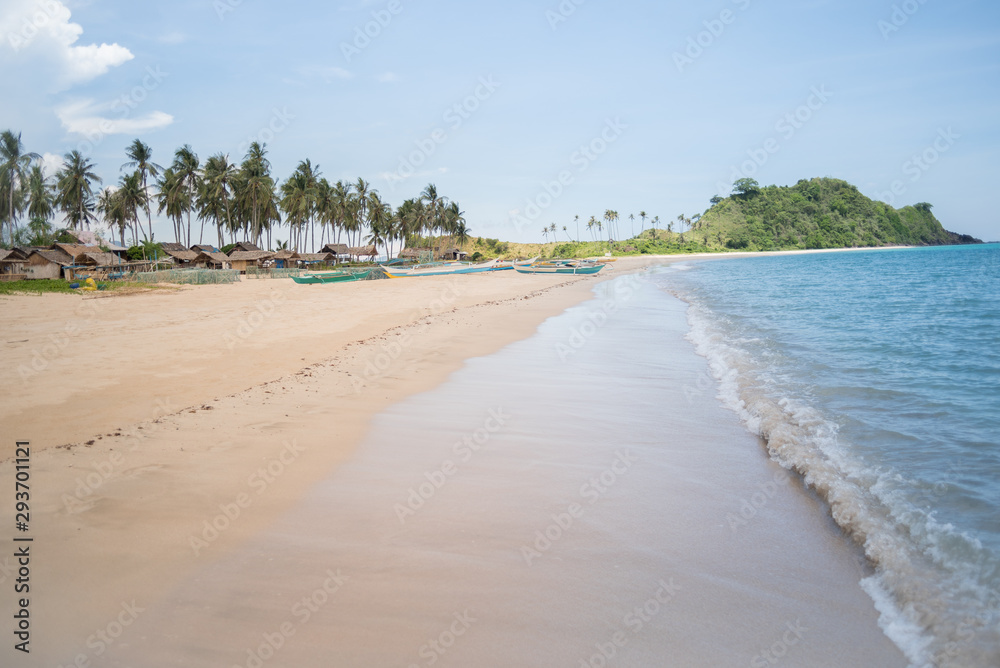 Obraz premium Native remote provincial province fishing village on a beach with a growing eco tourism industry and possible real estate development of beachfront resort hotels