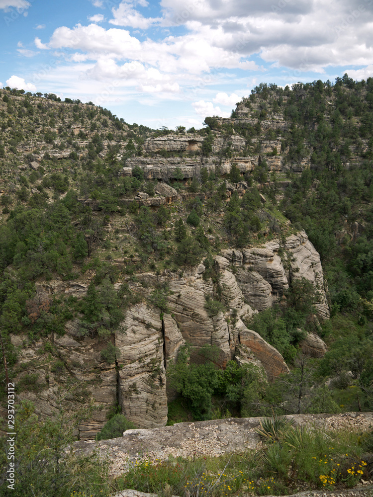 Cliff Dwellings carved in rock on Walnut Canyon stone wall, Arizona