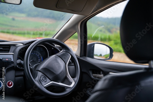 close up steering wheel in car