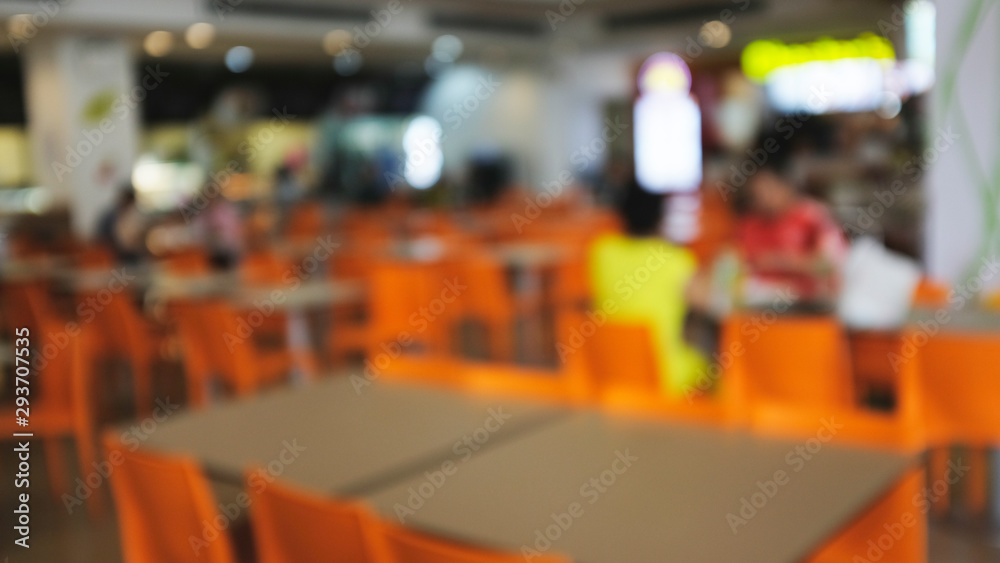 Abstract blurred of food court in department store..blur people sitting on seat in dining room with bokeh Abstract blurred of food court in department store..blur people sitting on seat in dining room with bokeh