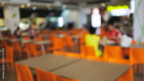 Abstract blurred of food court in department store..blur people sitting on seat in dining room with bokeh photo