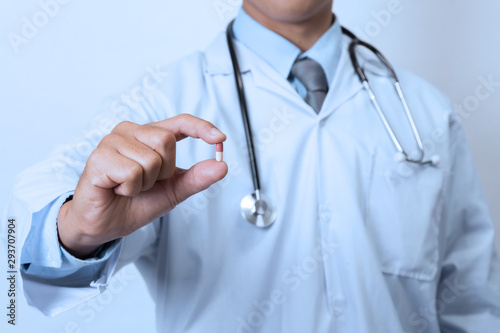 Doctor holding medicine