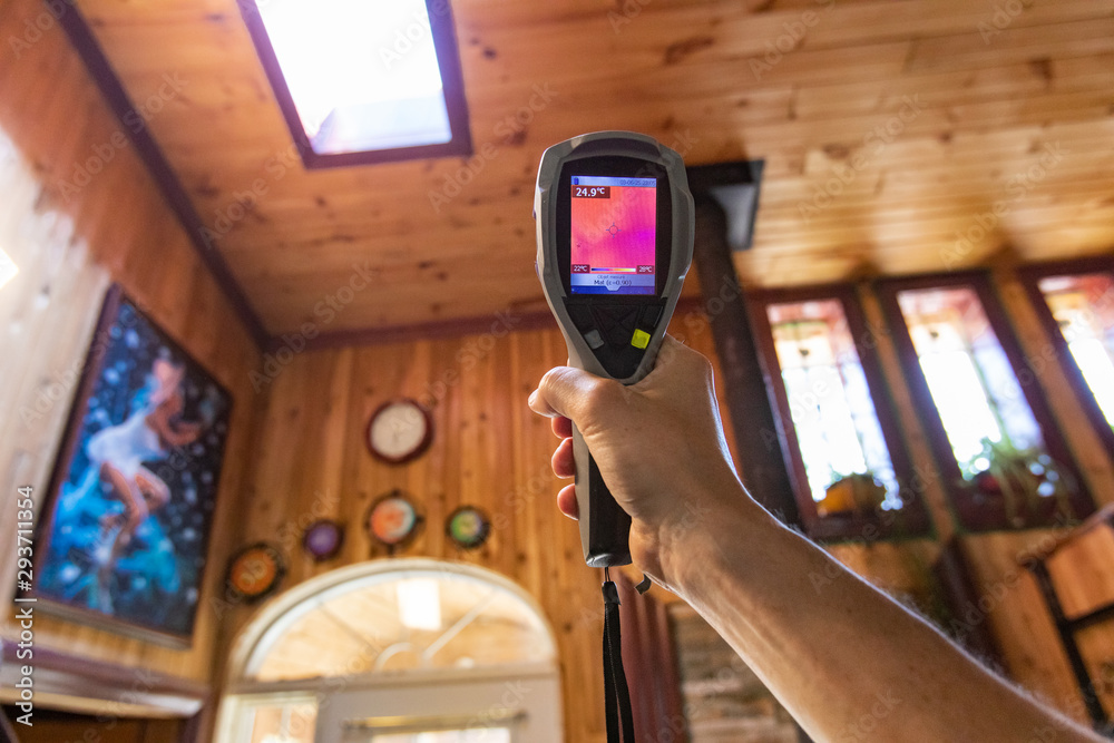 Indoor damp & air quality (IAQ) testing. A low angle first person