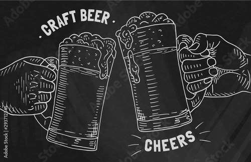 Two glasses of craft beer on the chalkboard background. Cheers
