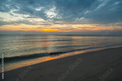 Siluette sunset at the beach background