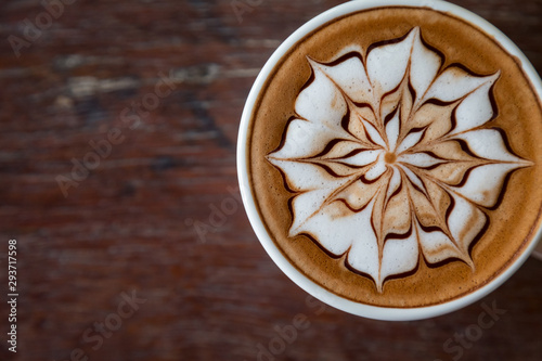 Cup of coffee with latte art on top