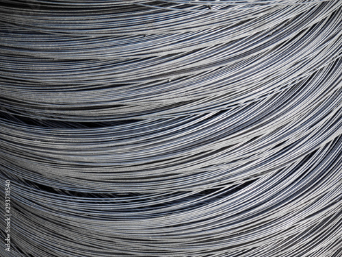 Roll of metal wire of silver color. Building material