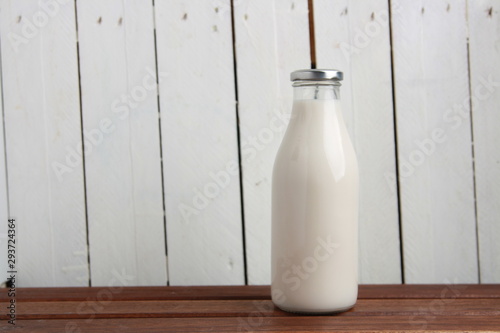glass bottle with delicious milk..