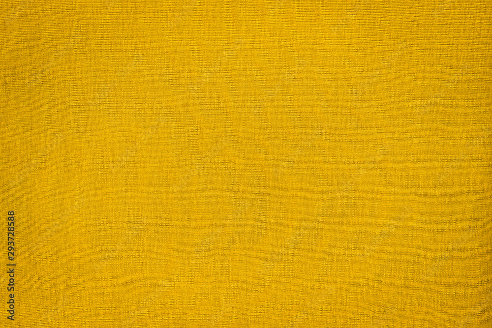 Texture of real yellow knitwear, textile background. Abstract background Texture of real yellow knitwear, textile background. Abstract background