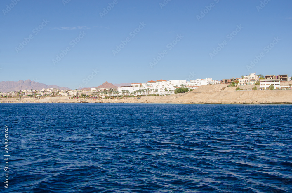 View of the coast with the buildings of the Sinai Peninsula of the Red Sea in Sharm el Sheikh (Egypt)