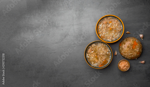 Homemade jelly meat with mustard, garlic on the table. Holodets, traditional Russian food photo