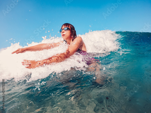 Girl swimming in the sea © kerkezz