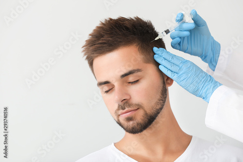 Man with hair loss problem ...