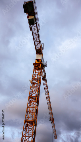 Tower crane on a background of thunderclouds