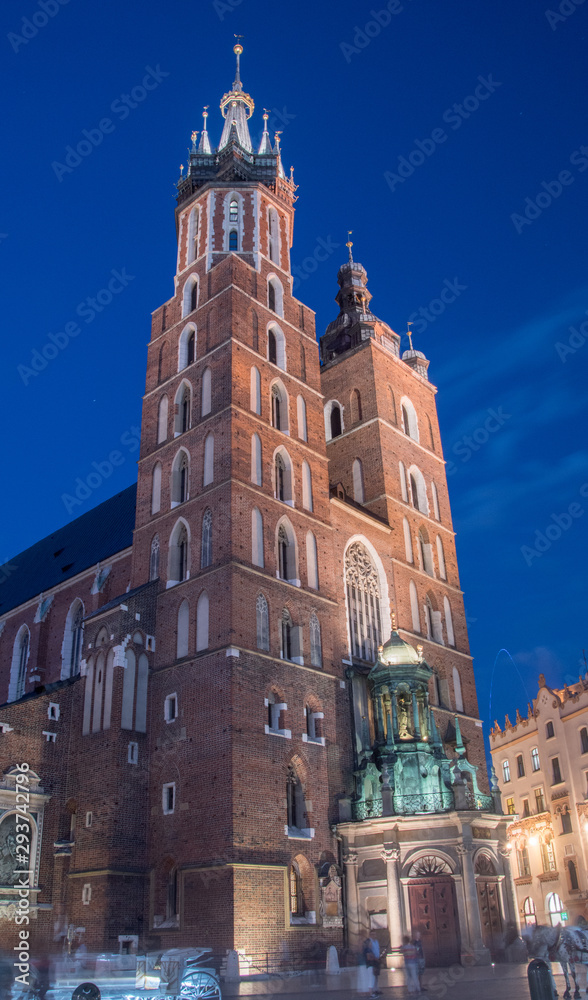 Basilica of Saint Mary at night in Krakow, Poland.
