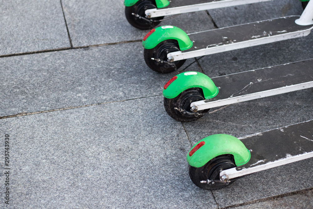 Obraz premium Electric Scooters used for transportation around the cities. Quick and easy way to travel. Transport scooter in Europe.