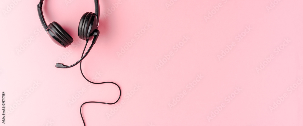 Customer service headset on pink background. Call center concept. Banner Customer service headset on pink background. Call center concept. Banner