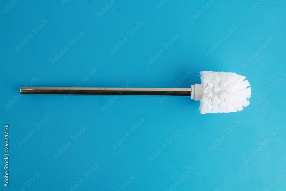 toilet brush in white and silver