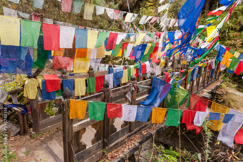 Holy bridge with colourful prayer flags