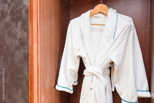 White bathrobe in closet