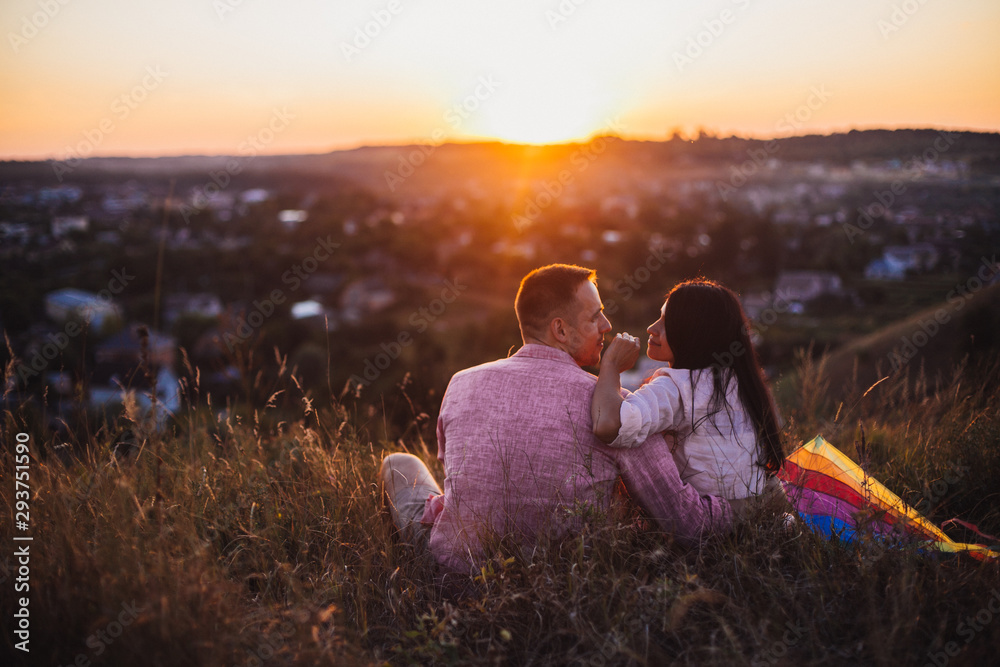 Lovely couple are happy. Genuine emotions by the young family