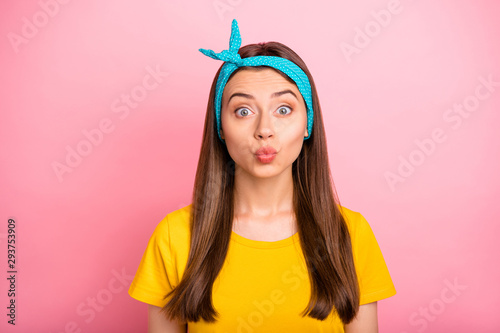 Photo of nice cute pinup cheerful girlfriend trying to draw attention of her beloved one and she is managing to do it well judging by her face while isolated with bright pink background