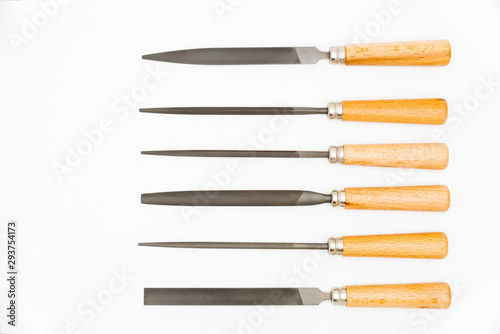 Set of rasp hand file tools on white background. Wooden handles. Needle Files set. S
