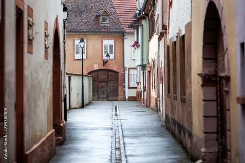 Wet narrow street in Wissembourg in France