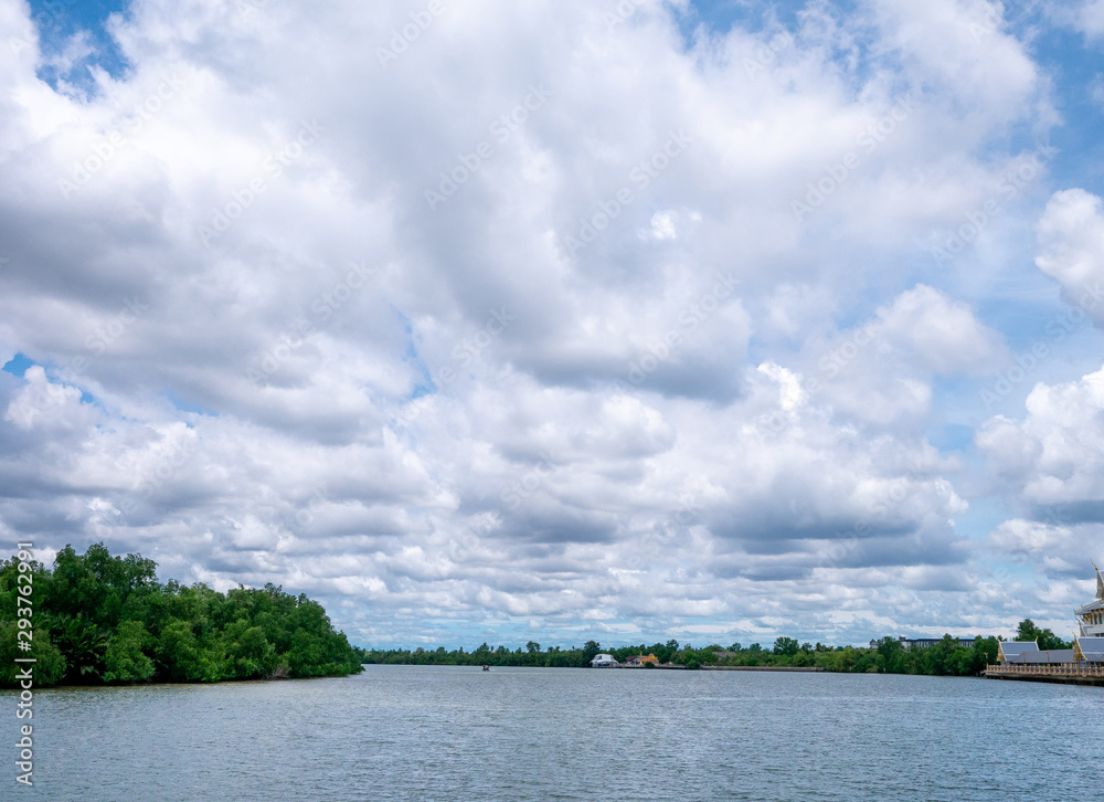 Fototapeta premium cloudy blue sky beyond the river