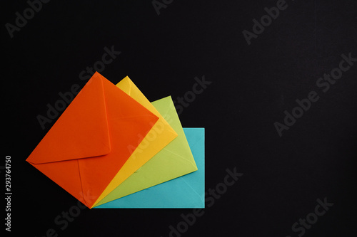 Greeting card, holiday decorations, colorful envelopes isolated