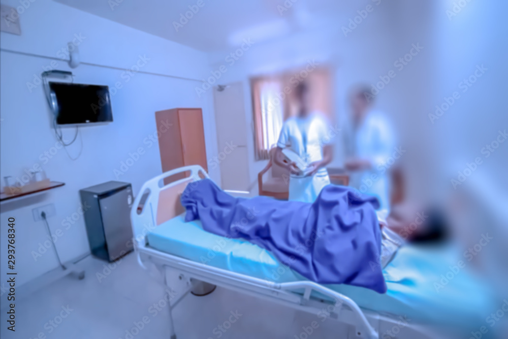 Blur photo - abstract image for the background. Medical staff bypasses bed patients. Blur photo - abstract image for the background. Medical staff bypasses bed patients.
