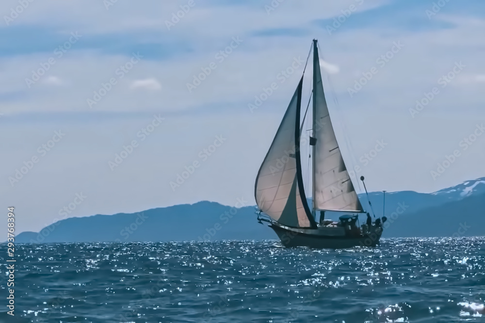 Blur photo - abstract image for the background. Yacht under sail in the ocean.