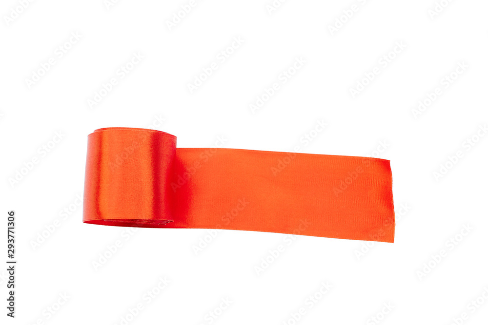 Obraz premium orange fabric tape rolled up with an unwound edge isolated on white