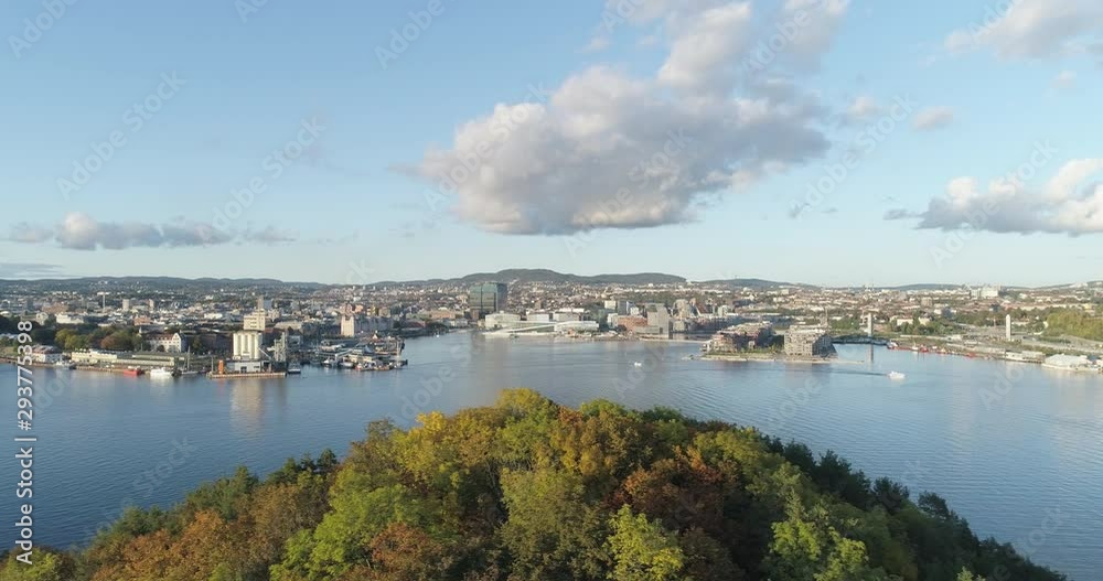 Cinema 4K drone shot with slide motion of Hovedøya island, the blue Oslofjord and the new Bjørvika quarter project with the Lambda Munch Museum and Oslo Opera House in autumn fall, in Oslo Norway. Cinema 4K drone shot with slide motion of Hovedøya island, the blue Oslofjord and the new Bjørvika quarter project with the Lambda Munch Museum and Oslo Opera House in autumn fall, in Oslo Norway.