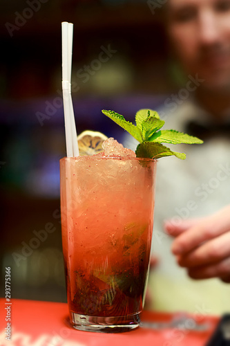 Woman Barman Making Strawberry Mahito Cocktail